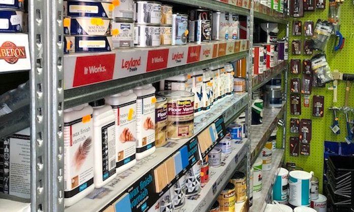Wood oils and varnishes arranged on a shelf